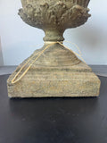 Ornate Stone Urn with River Rocks & Faux Moss