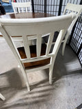 Ashley Furniture Two Tone Round Dining Table with (4) Chairs