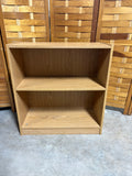 Particle Board Bookcase with Adjustable Shelves; cardboard backing