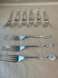 Reed & Barton Roman Medallion Forks - 9 Piece