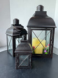 Trio of Distressed Bronzed Metal Lanterns with 3 Flameless Candles (WORKS)