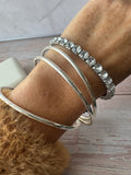 Trio of Silver Tone Bangle Bracelets with Rhinestone Stretch Bracelet
