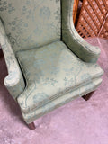 Green Upholstered Wingback Chair