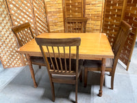 Dining Table with (4) Chairs by Ashley Furniture