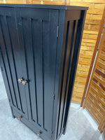 Black Particle Board Cabinet with Pumpkin Knobs