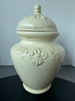 Large Cream Colored Embossed Ceramic Urn