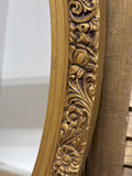 Oval Mirror with Embossed Flowers