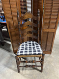 Round Table with (2) Leaves and (4) Ladder Back Chairs, with Plaid Seat Cushions.