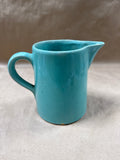 Teal Unmarked Pottery Pitcher