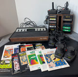 Atari Tele-Games Video Arcade System with Controllers, Games, Manuals & Accessories