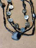 Long Black Beaded Necklace with Mother of Pearl