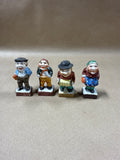 Set Of 4 Japan Occupied Figurines