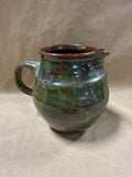 Green And Brown Glazed Pottery Pitcher — Signed At Bottom