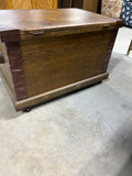 Antique Wooden Trunk with Metal Accents on Casters