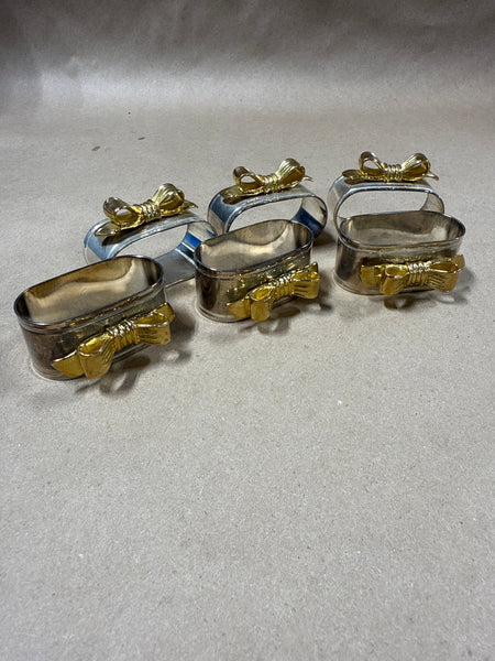 Silver And Brass Bow Napkin Rings