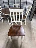 Ashley Furniture Two Tone Round Dining Table with (4) Chairs