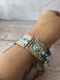 Silver Tone Hinged Cuff Bracelet with Blue Stones