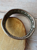 Silver Tone Hinged Cuff Bracelet with Blue Stones
