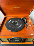 The Crosley CR245 Director Retro Style 3-Speed Turntable with CD Recorder & AM/FM Radio