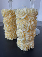 Pair of Pier 1 Glass Pedestal Hurricanes with Rose Carved Pillar Candles