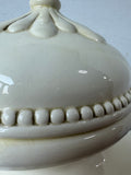 Large Cream Colored Embossed Ceramic Urn