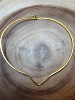 (A) Gold Tone Omega Necklace