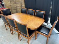 Mid Century Modern Style Dining Table with (2) Leaves and (8) Chairs