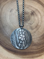 Silver Tone Necklace with Large Floral Medallion