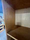 Tall Bookcase with Adjustable Shelves; Card board backing.