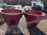 A-Pair of Red Plastic Planters