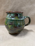 Green And Brown Glazed Pottery Pitcher — Signed At Bottom
