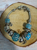 Trio of Blue Accented Silver Tone Bracelets