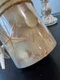 Pair of Pier 1 Imports Glass Seashell Pillar Candle Holders with Candles
