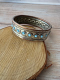 Silver Tone Hinged Cuff Bracelet with Blue Stones
