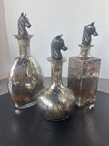 Trio of Reproduction Mercury Glass Style Decanters with Metal Horse Head Stoppers