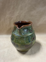 Green And Brown Glazed Pottery Pitcher — Signed At Bottom