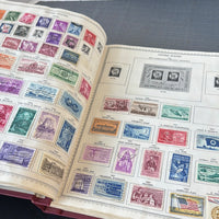 (D) The New World Wide Postage Stamp Album 1/4 Filled with Stamps