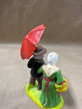 European Folk Art Couple Under Umbrella Figurine