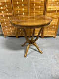 Round Wooden Occasional Table with Mid Century Flair
