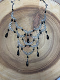 Cascading Silver Tone Necklace with Black Beads