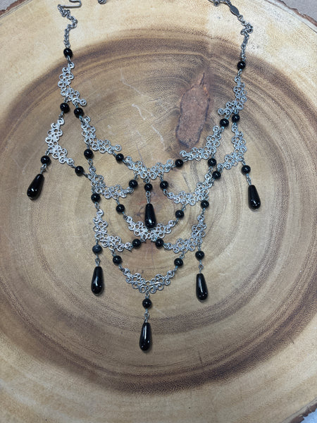 Cascading Silver Tone Necklace with Black Beads