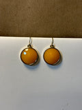 Gold Tone Earrings with Round Peach Faceted Stone