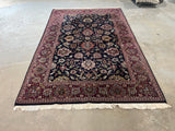 Hand Woven Rug, 9 ft 4 in x 5 ft 9 in. (navy, pink, cream color tones)