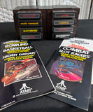 Lot of 8 Assorted Atari 2600 & 7800 Games with Manuals in 8-Cartridge Musicmate Modular Storage Rack (B)