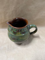 Green And Brown Glazed Pottery Pitcher — Signed At Bottom