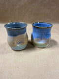 Pair Of Earth Tone Indented Pottery Cups