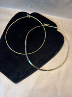 Pair of Gold Tone Omega Necklaces