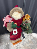 Standing Santa Holding Toys And Wreath