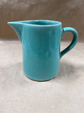 Teal Unmarked Pottery Pitcher