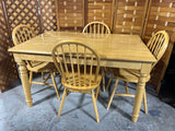 Ashley Furniture Table with Fold Away Leaf and (4) Chairs***HEAVY ITEM***READ DETAILS ON PICK UP POLICY***